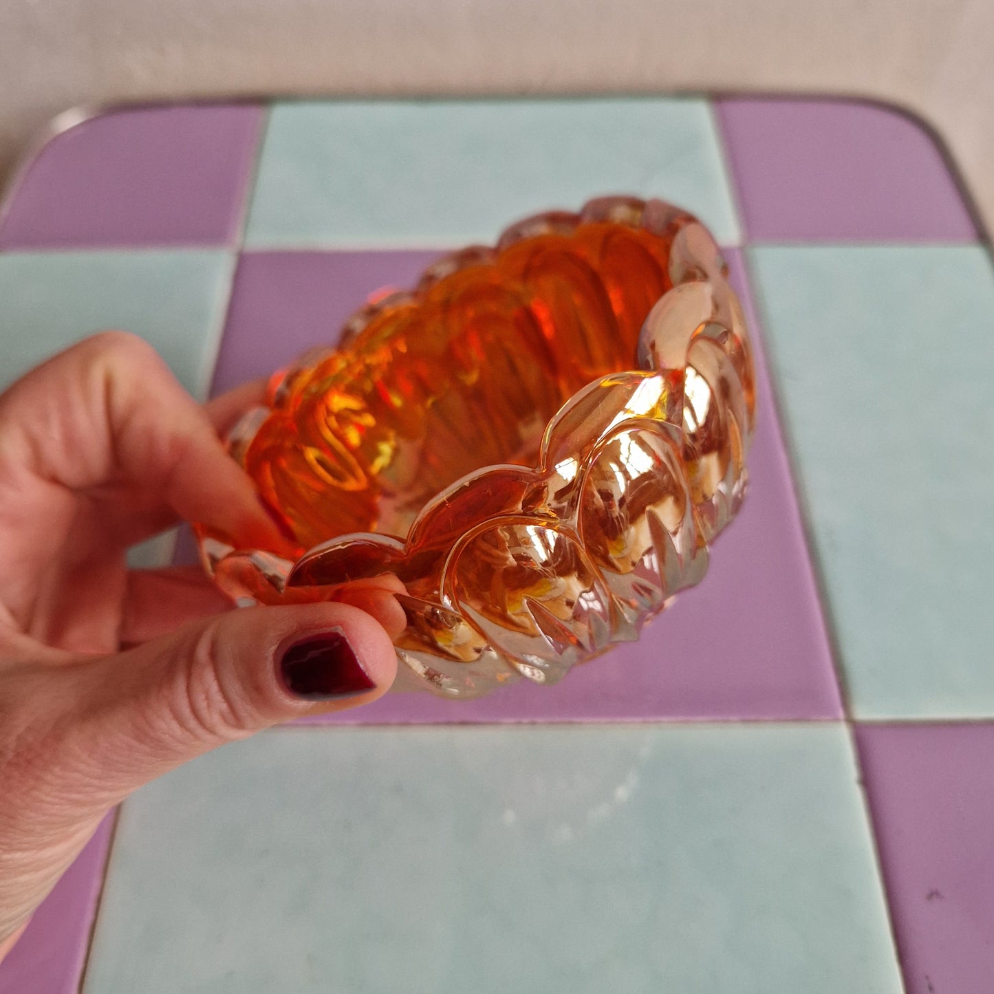 Iridescent marigold carnival glass bowl
