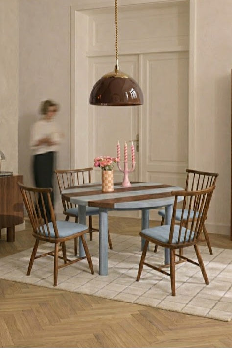 Round wooden table, striped design